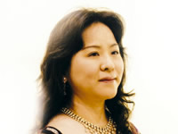 菅　英三子